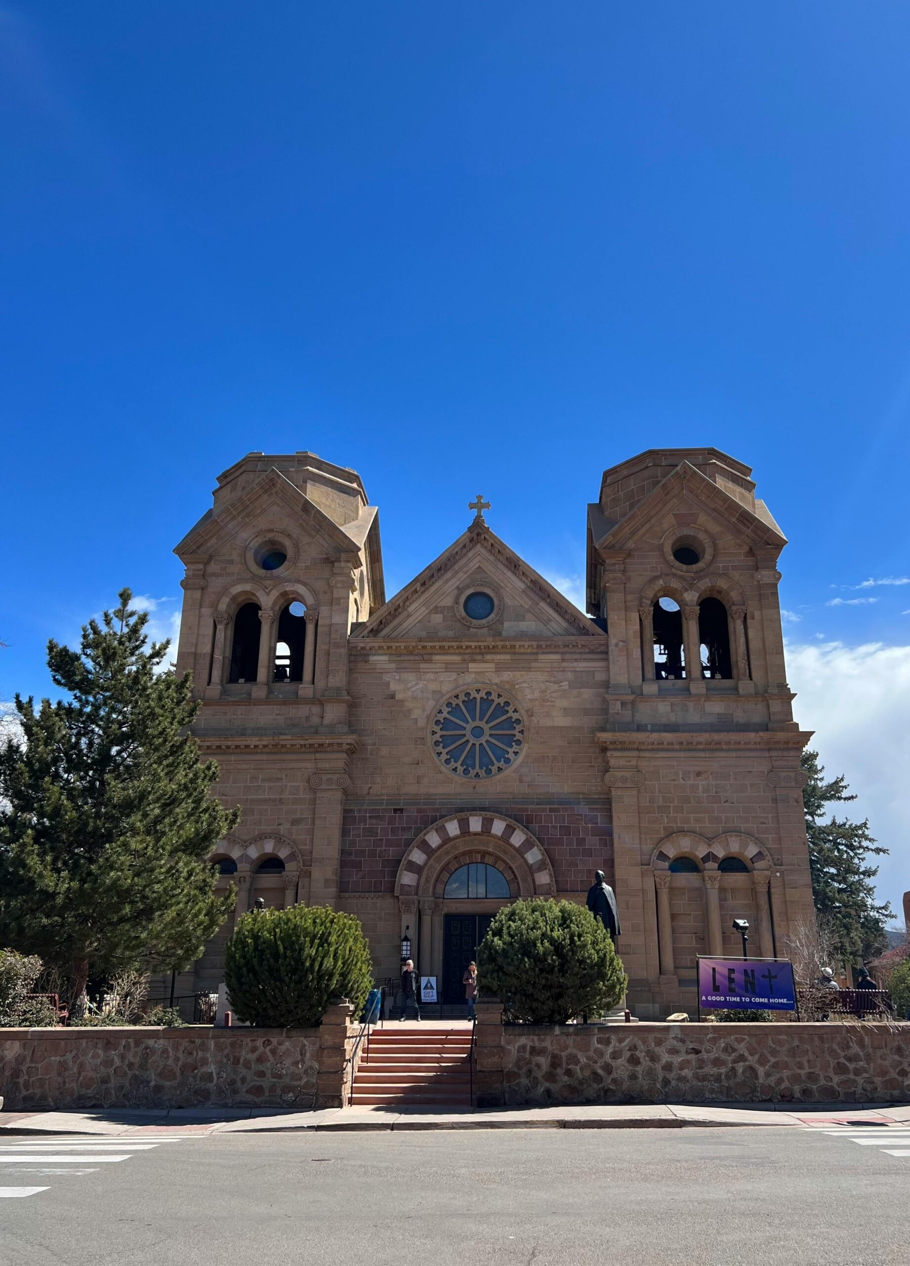 pexels-photo-20768890-20768890 Historic Cathedral Basilica of St. Francis in Santa Fe, New Mexico under a clear blue sky.